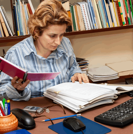 A proofreader uses Language Typesetting Services to compare multilingual PDF proofs for print and digital channels.