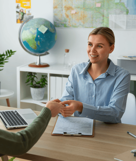 A translator working on USCIS-compliant birth certificate translation services for a customer applying for a green card. A translator working on USCIS-compliant birth certificate translation services for a customer applying for a green card.