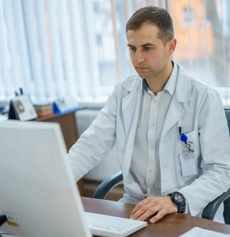 A doctor using Medical Translation Services helps researchers translate clinical trials and medical content professionally.