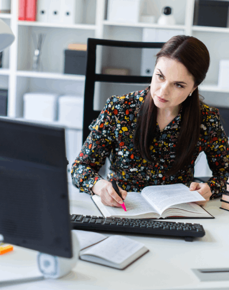 A typesetter compares adult and teen chapter pages as Book Typesetting Services adjust fonts, spacing, and headers.