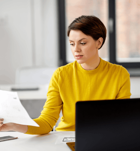 An editor reviews a proof as composition typesetting services end-to-end flag layout issues before a journal submission.