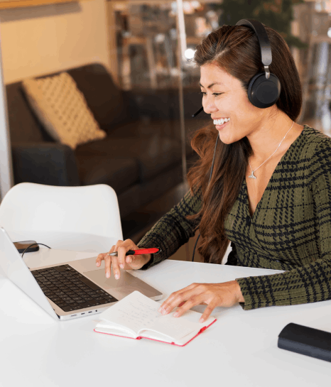 A specialist reviews transcripts with a QA rubric as Research Transcription Services meet regulated institution standards.