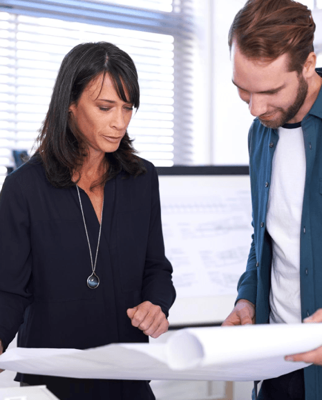 A QA team compares a bilingual spec sheet while Polish Translation Services confirm technical accuracy before release.