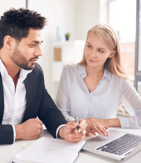 Specialists compares a deed of trust to its translated copy, matching formatting for mortgage translation services.
