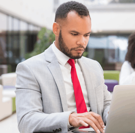 A product manager reviews region-specific Swahili checkout prompts, using Swahili translation services to boost trust.