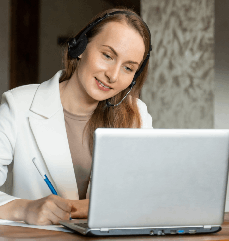 A subtitler compares a regional German style guide with dialogue notes, providing german subtitling services for local reach.