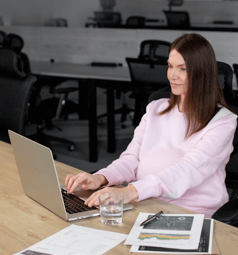 Formatter working on a business document, ensuring consistent formatting and reliable results for a polished presentation.