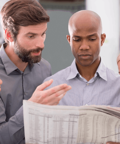 Two researchers tag Q&A segments in a focus group transcript, using german transcription services for interview research notes.