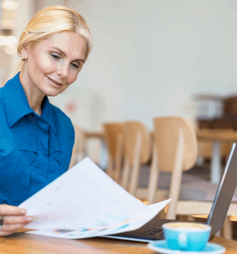 A researcher reviews EU policy documents while Czech translation services online preserve accurate terminology and context.