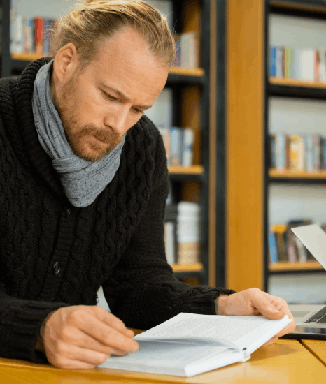 A linguist reviews a contract and certificate, applying Bosnian translation services for accurate document wording.