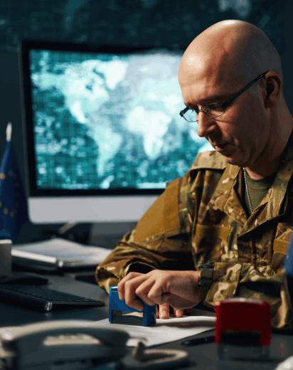 A linguist applies a certification seal to a translated service record, using Military Translation Services for accuracy.