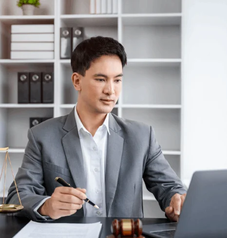 Lawyer using Legal document translation service to ensure seamless communication for cross border legal matters & compliance.