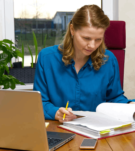 An engineer reviews a bilingual spec sheet, using Croatian translation services for sector-specific manufacturing terms.