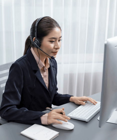 A linguist compares Mandarin subtitles to the script, checking subtitle accuracy in chinese subtitling services.