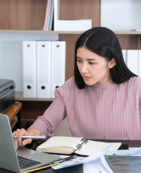 A client compares original and translated feedback forms, showing how Survey Translation Services improve document clarity.