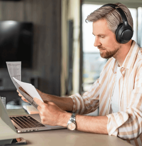 A linguist reviews Swiss German phrases for german subtitling services, choosing wording that preserves dialect meaning.