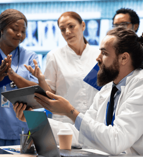 A hospital formulary team checks translated medication guidelines as pharmaceutical translation services reduce clinical.