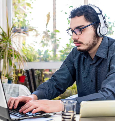 An IT lead reviews VTT captions from Haitian Creole Transcription Services while troubleshooting a technical demo video.