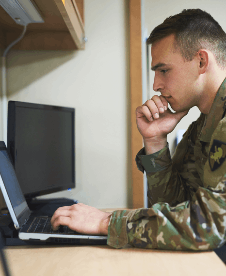 An engineer compares a bilingual technical manual, using Military Translation Services to verify steps for equipment safety.
