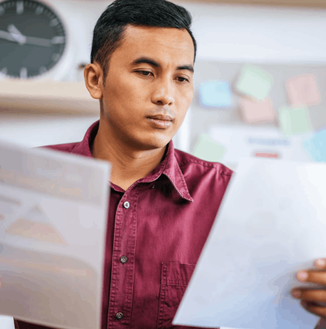 A translator updates a terminology glossary so Javanese translation services keep client-approved wording across documents.