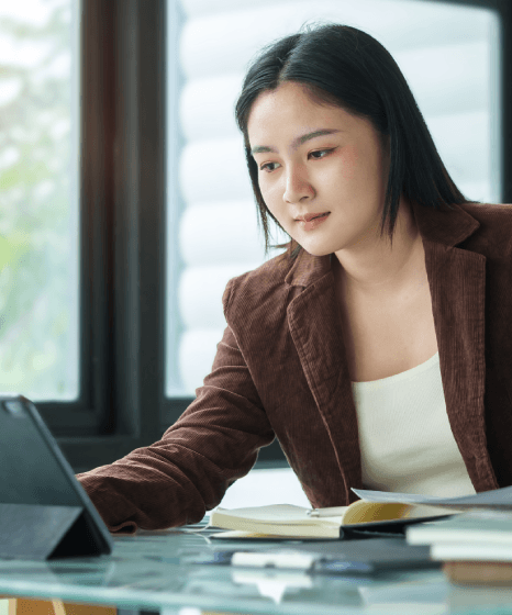 A translator updates a textbook glossary and figure notes, using Book Translation Services for academic genre clarity.