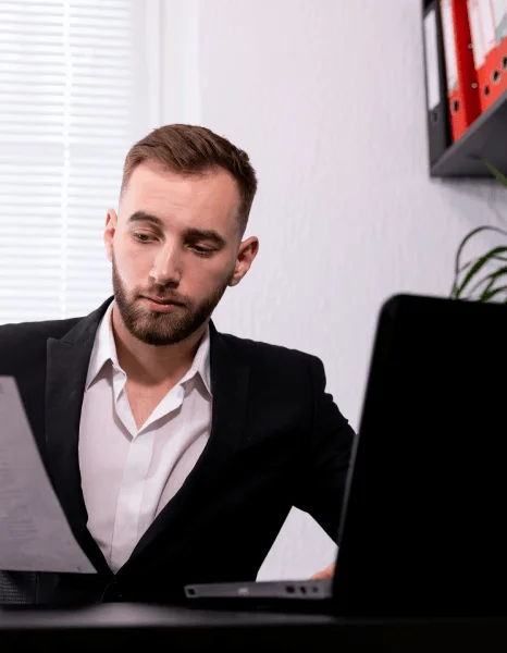 A reviewer checks names and dates as Quick Translation Services completes a time-sensitive translation for legal submission.