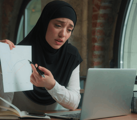 A translator compares source and target text to keep tone consistent, using Malay translation services for a website page.