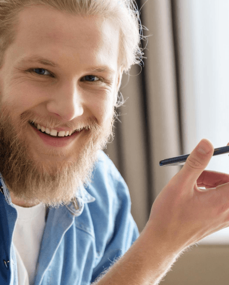 A producer reviews Polish Voice Over Services, adjusting culturally accurate tone and wording for an audience-focused ad.