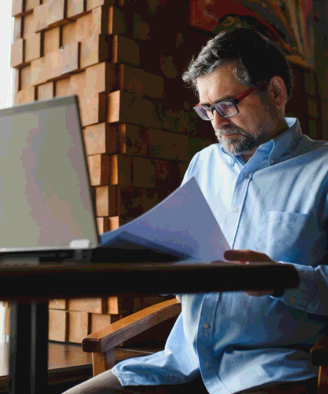 A client uploads scanned records to a portal as Greek Translation Services deliver secure online results fast.