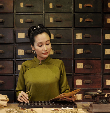 A client uploads files to a rush portal while Tibetan translation services prepare a last-minute submission before cutoff.