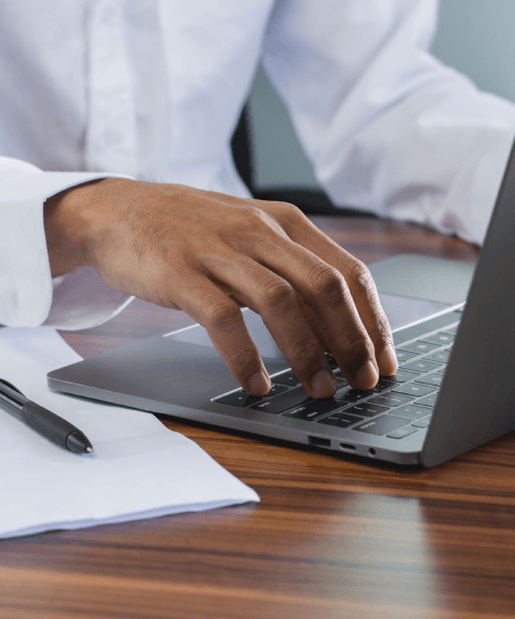 A project lead compares Urdu and English copy as Urdu Translation Services ensure Urdu to English clarity for clients.