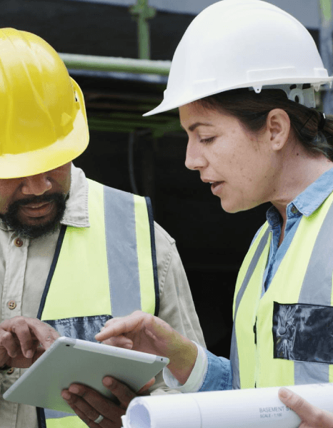 A coordinator compares SOPs, labels, and manuals, using manufacturing translation services to meet varied requirements.