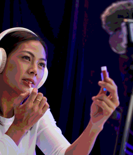 A marketer reviews Vietnamese Voice Over Services for a short ad, confirming tone and pacing for digital media platforms.