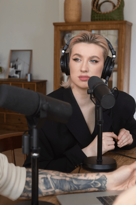 A native speaker records in a treated studio for Voice-Over Services, showing exceptional delivery across simple and complex.