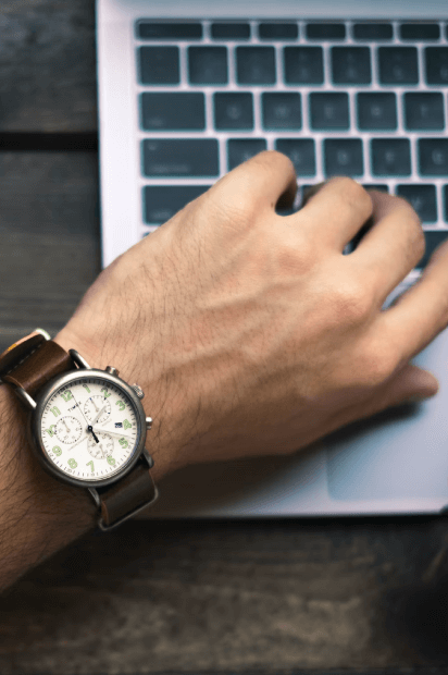 A picture of wristwatch and a laptop