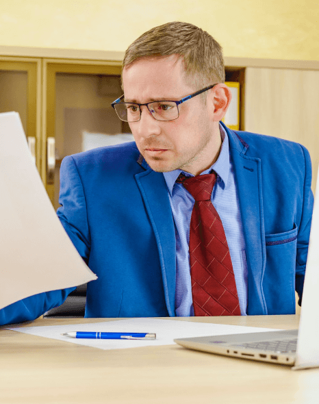 A marketer reviews localized web pages as Estonian translation services adapt tone for diverse international audiences.