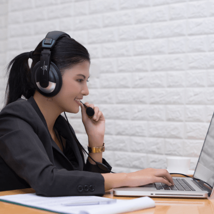 A webinar producer checks captions and descriptive video services tracks to support training media access across platforms.