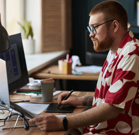 A UX editor previews a Latvian website localization build while Latvian translation services refine menu labels and CTAs.