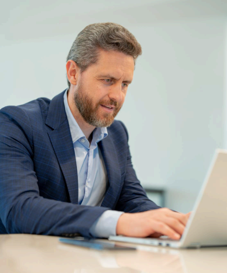 A translator updates a checkout page, using affordable website translation services so pricing terms read clearly in each.