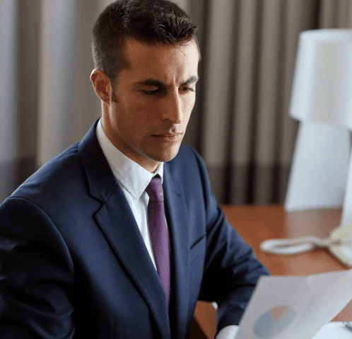 Legal expert reviewing translated witness statements to ensure accuracy and compliance in court cases.