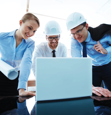 Engineers review a technical manual as dutch translation services apply industry terms for an automotive supplier.