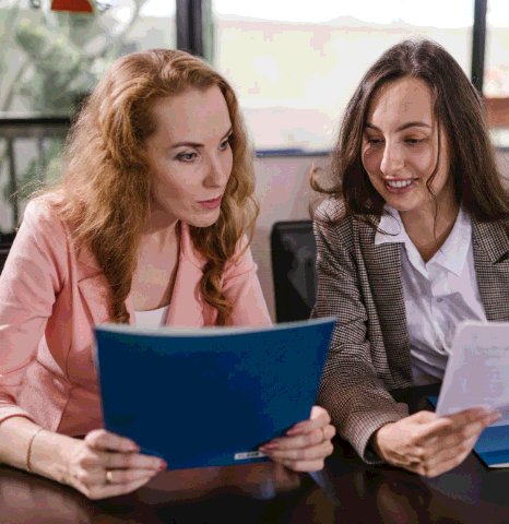 A translation team reviews industry terminology tables, using Greek Translation Services to keep each sector’s tone.