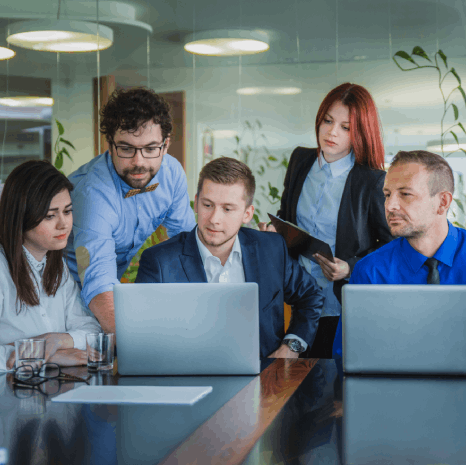 A global HR team reviews multilingual policies as Human Resources Translation Services protect the workforce worldwide.