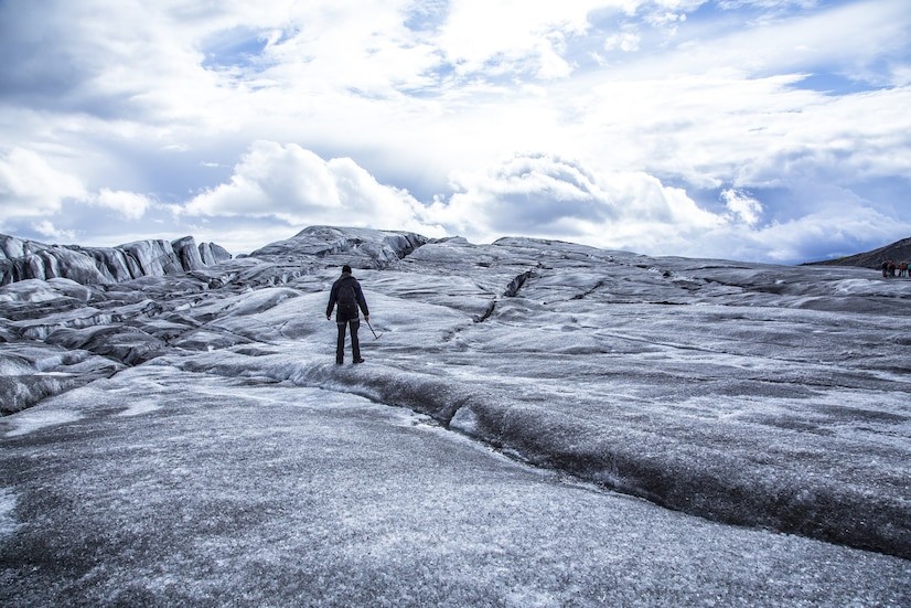 Young man doing the glacier trekking in iceland