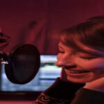 A professional voiceover artist working to deliver high-quality and accurate voiceovers