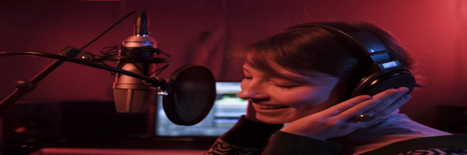 A professional voiceover artist working to deliver high-quality and accurate voiceovers