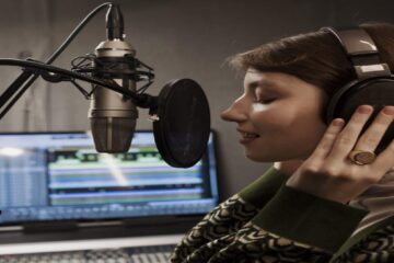 A voice-over artist working to deliver high-quality voice-overs on video