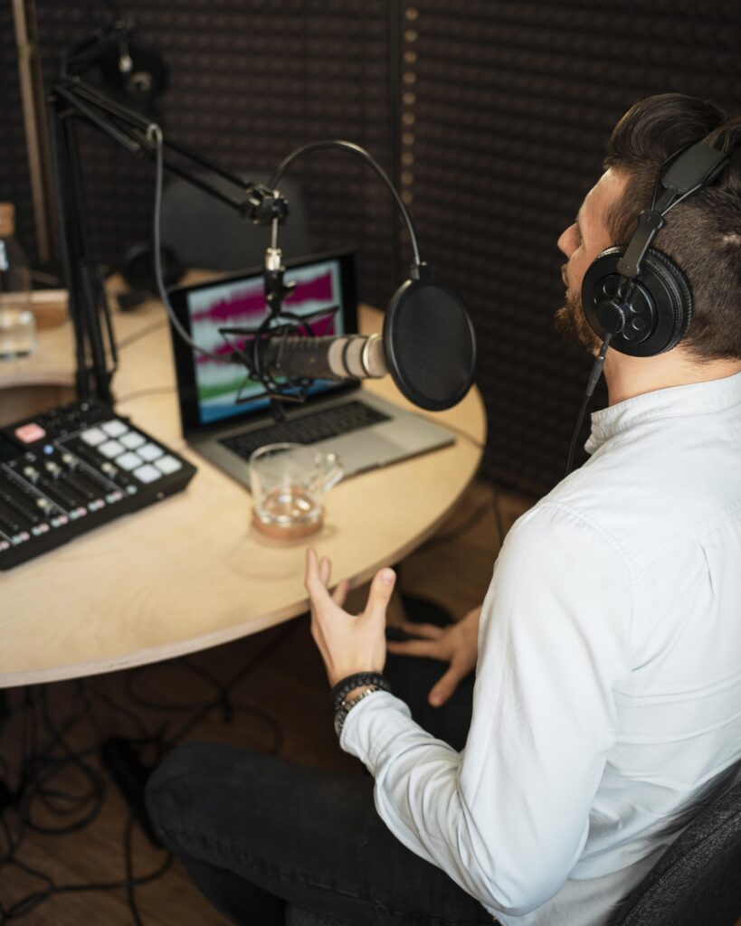Illustration of a professional voice over artist recording in a studio for business hiring best practices.