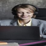 A person working on a laptop to create a substitle at an affordable price