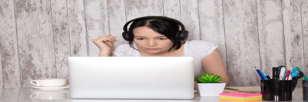 A person working on video to create high-accuracy subtiling for an affordable rate